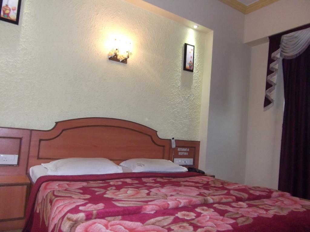 Hotel Ravikant Пуне Номер фото